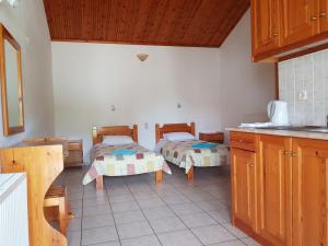 Posteľ alebo postele v izbe v ubytovaní Asimina's House