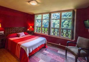 Postel nebo postele na pokoji v ubytování Hotel del Alto Sella