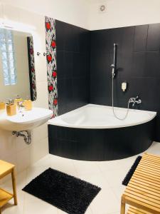 Kúpeľňa v ubytovaní Nexus Apartmenthotel