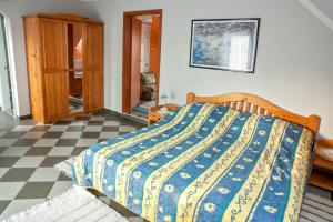 Posteľ alebo postele v izbe v ubytovaní Katica Apartman
