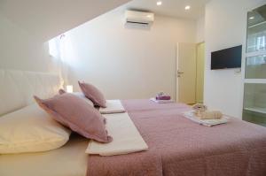 Postel nebo postele na pokoji v ubytování Apartman Split Old Town Center