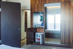 Postel nebo postele na pokoji v ubytování Sky Inn Batumi