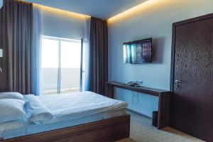 TV a/nebo společenská místnost v ubytování Sky Inn Batumi