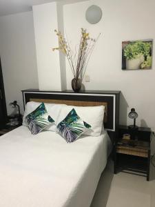 Voodi või voodid majutusasutuse Hotel Meson de las Flores toas