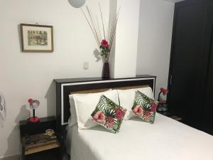 Voodi või voodid majutusasutuse Hotel Meson de las Flores toas