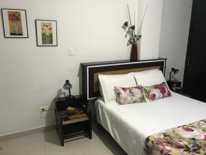Voodi või voodid majutusasutuse Hotel Meson de las Flores toas