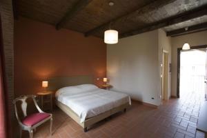 Postel nebo postele na pokoji v ubytování Agriturismo Camisassi