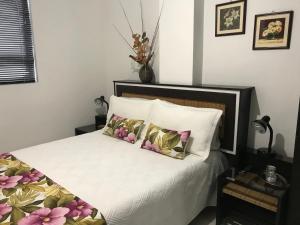 Voodi või voodid majutusasutuse Hotel Meson de las Flores toas