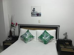 Voodi või voodid majutusasutuse Hotel Meson de las Flores toas