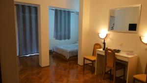 Postel nebo postele na pokoji v ubytování Guest House Mamut