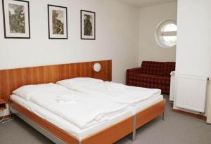 Postel nebo postele na pokoji v ubytování Hotel Maxim + 12 fotografií