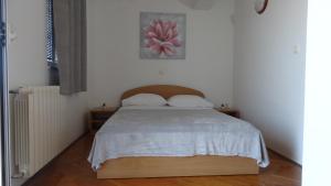 Postel nebo postele na pokoji v ubytování Guest House Mamut