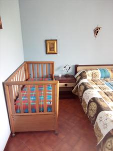 Ένα ή περισσότερα κρεβάτια σε δωμάτιο στο Condominio Ariazzurra S. Bart. +38 φωτογραφίες