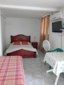 Posteľ alebo postele v izbe v ubytovaní Posada los Caracoles