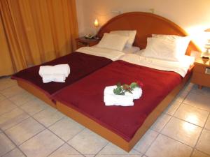 Postel nebo postele na pokoji v ubytování Hotel Lito