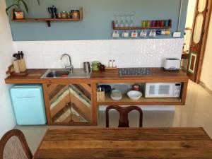 Virtuvė arba virtuvėlė apgyvendinimo įstaigoje Loft Alpaca