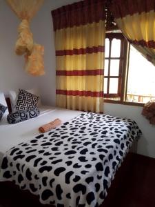 Voodi või voodid majutusasutuse Tunnel Gap Homestay toas