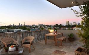 En balkon eller terrasse på Saint George - The Townhouse