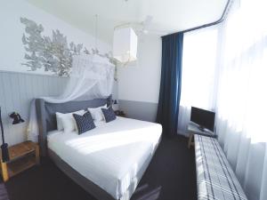 Postel nebo postele na pokoji v ubytování Hotel Palisade