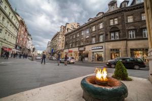 a fire pit in the middle of a city street at Premium Apartments in Sarajevo