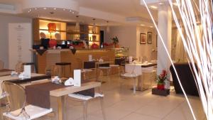 En restaurant eller et andet spisested på Hotel La Corte
