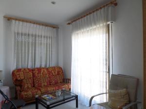 Posedenie v ubytovaní Apartamento primera linea de playa WIFI gratis