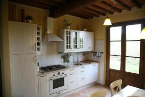 Кухня или мини-кухня в La Fonte al Prete
