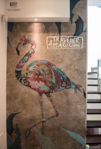 a mural of a turkey on a wall at Porto Cesareo Exclusive Room in Porto Cesareo