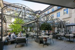 ห้องอาหารหรือที่รับประทานอาหารของ Hotel Glockenhof Zürich