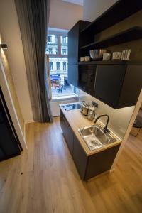 A cozinha ou cozinha compacta de Premium Apartments