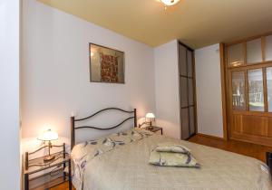 Ένα ή περισσότερα κρεβάτια σε δωμάτιο στο Vanagas Apartments +22 φωτογραφίες