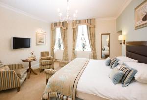 Ένα ή περισσότερα κρεβάτια σε δωμάτιο στο The George Hotel +48 φωτογραφίες