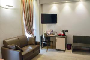 TV a/nebo společenská místnost v ubytování Hotel Continental