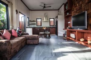 Posezení v ubytování Baan Pinya Cosy One Bedroom Executive Bungalow