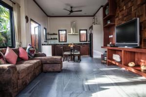 TV a/nebo společenská místnost v ubytování Baan Pinya Cosy One Bedroom Executive Bungalow