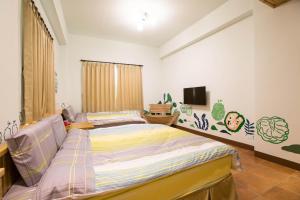 TV a/nebo společenská místnost v ubytování Sen Yun Chuang Yuan Homestay NO1249