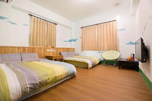 Katil atau katil-katil dalam bilik di Sen Yun Chuang Yuan Homestay NO1249