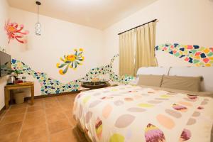 Katil atau katil-katil dalam bilik di Sen Yun Chuang Yuan Homestay NO1249