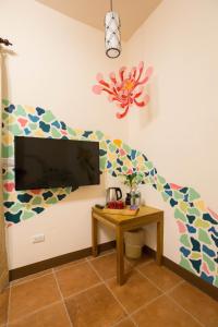 Televisyen dan/atau pusat hiburan di Sen Yun Chuang Yuan Homestay NO1249