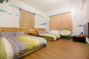 Postel nebo postele na pokoji v ubytování Sen Yun Chuang Yuan Homestay NO1249 + 37 fotografií