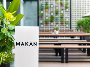 a row of benches with the word makan on it at Tune Hotel KLIA-KLIA2, Airport Transit Hotel in Sepang