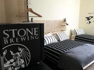 Postel nebo postele na pokoji v ubytování La Sosta Navarra Bed & Beer