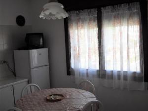 A kitchen or kitchenette at Casa Armanda