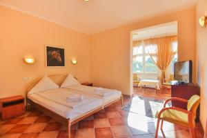Postel nebo postele na pokoji v ubytování Villa Antares I & II