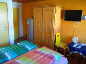 Postel nebo postele na pokoji v ubytování Landhaus Graßmann