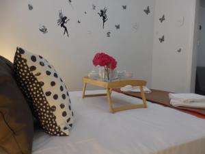 A bed or beds in a room at Nikiti Maisonette on the beach by Luxlikehome