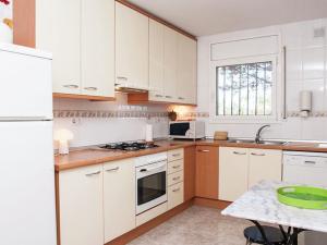 A kitchen or kitchenette at Splendid Villa with Private Swimming Pool in Costa Brava