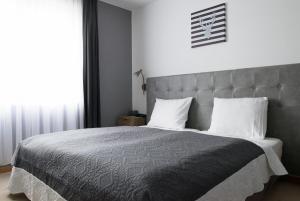 Postel nebo postele na pokoji v ubytování Hotel De Fierlant + 37 fotografií