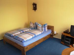 Ένα ή περισσότερα κρεβάτια σε δωμάτιο στο Ferienwohnung Raddatz