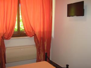 A television and/or entertainment centre at B & B OASI